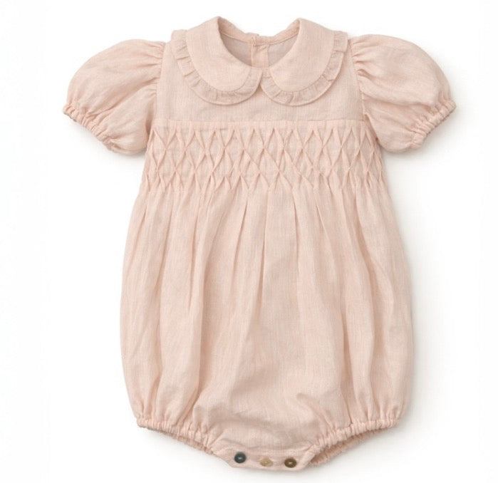 Pagliaccetto bimba rosa cipria con colletto e smock