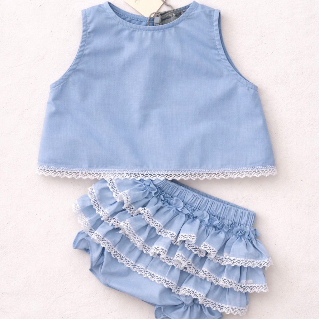 Completo celeste con pizzo