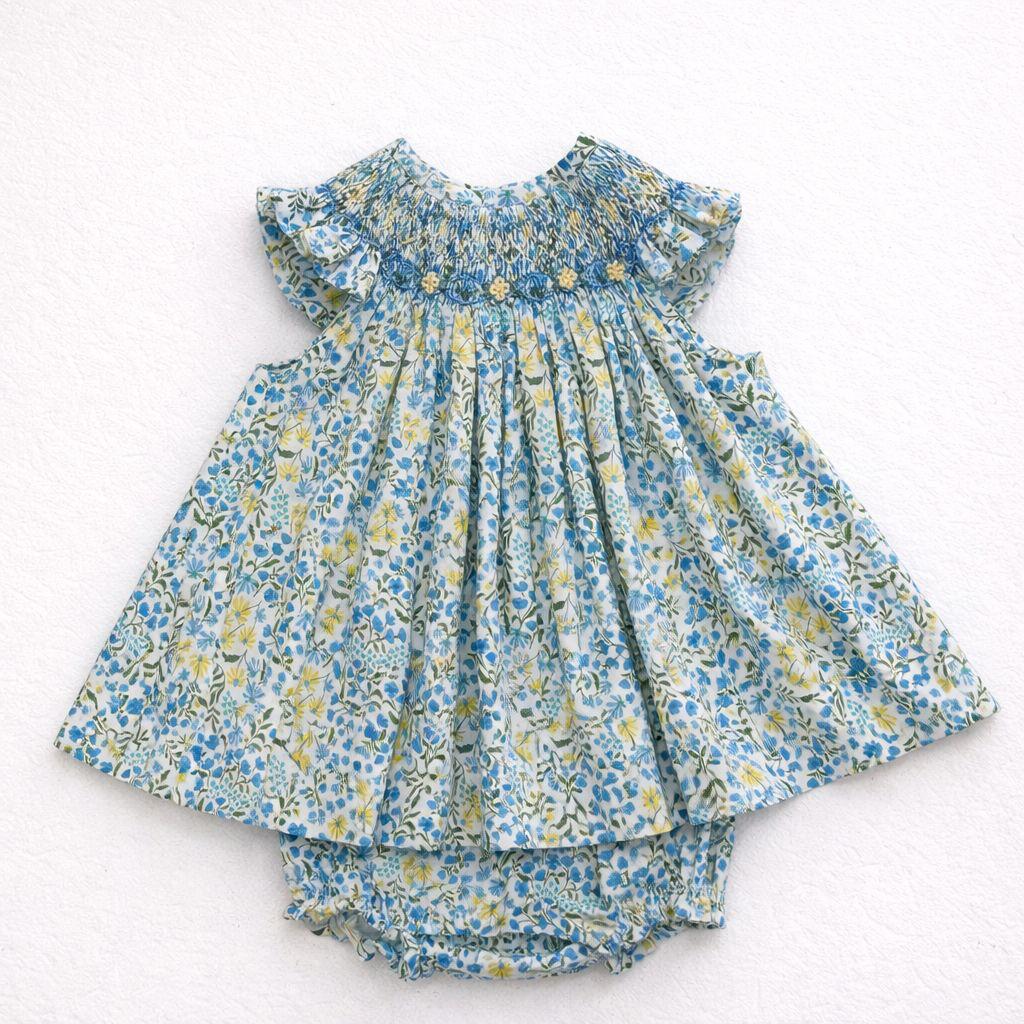 Completo bambina floreale con smock ricamato