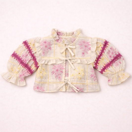 Blusa floreale romantica con fiocchi