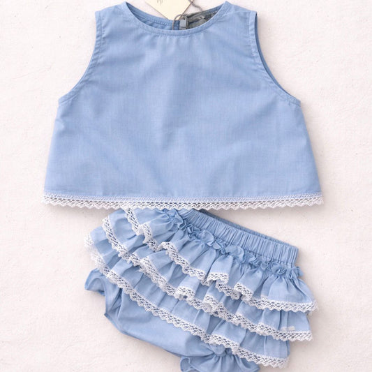 Completo celeste con pizzo